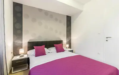 Krevet ili kreveti u jedinici u objektu Two-Bedroom Apartment In Podstrana