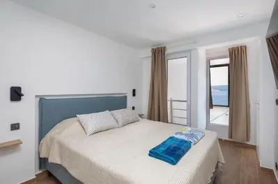 Krevet ili kreveti u jedinici u objektu Duplex Laurentis - private pool - beachfront - newly built