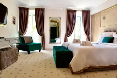 Krevet ili kreveti u jedinici u objektu Villa Giardino Heritage Boutique Hotel Bol