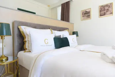 Krevet ili kreveti u jedinici u objektu Villa Giardino Heritage Boutique Hotel Bol
