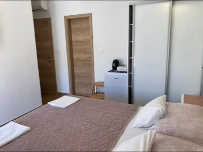 Krevet ili kreveti u jedinici u objektu Apartments SKY