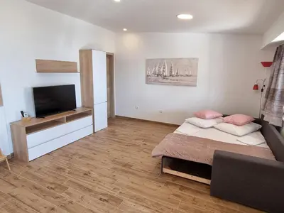 TV i/ili zabavni centar u objektu Apartments SKY