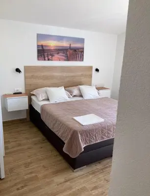 Krevet ili kreveti u jedinici u objektu Apartments SKY