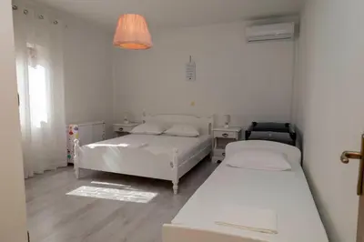 Krevet ili kreveti u jedinici u objektu Holiday house 