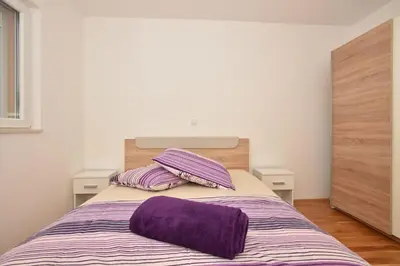 Krevet ili kreveti u jedinici u objektu Apartment Anna A2+2