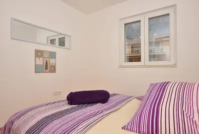 Krevet ili kreveti u jedinici u objektu Apartment Anna A2+2