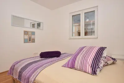 Krevet ili kreveti u jedinici u objektu Apartment Anna A2+2