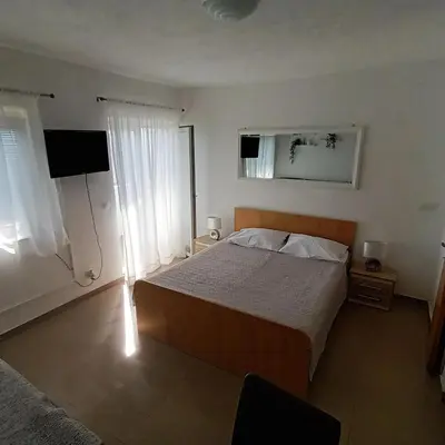 Krevet ili kreveti u jedinici u objektu Apartments Monika Omiš