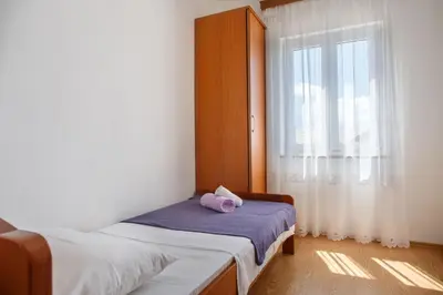 Krevet ili kreveti u jedinici u objektu Apartments with parking space Nemira, Omis - 15727