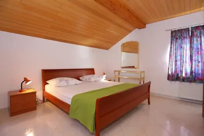 Krevet ili kreveti u jedinici u objektu Apartments by the sea Duce, Omis - 16406