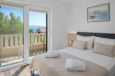 Krevet ili kreveti u jedinici u objektu Casa ol'Bol - Modern Apartment with Seaview and Private Large Backyard