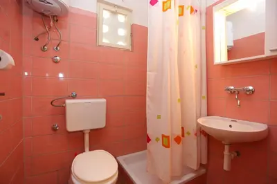 Kupaonica u objektu Apartment Supetar 16656b