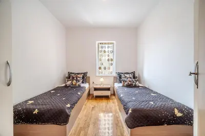 Krevet ili kreveti u jedinici u objektu Moenia Apartments