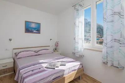 Krevet ili kreveti u jedinici u objektu Sandy Beach Apartment