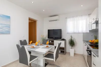 TV i/ili zabavni centar u objektu FBA Family Beach Apartments