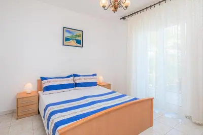 Krevet ili kreveti u jedinici u objektu FBA Family Beach Apartments