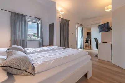 Krevet ili kreveti u jedinici u objektu Apartments Amigos