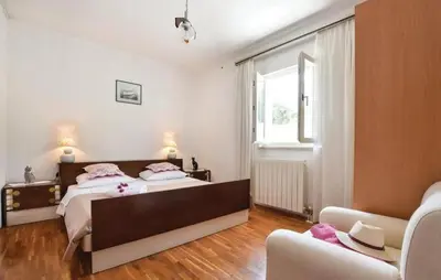 Krevet ili kreveti u jedinici u objektu Family-friendly apartments with swimming pool Supetar, Brac - 16774
