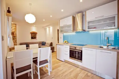 Kuhinja ili čajna kuhinja u objektu Paradise Stone Apartments