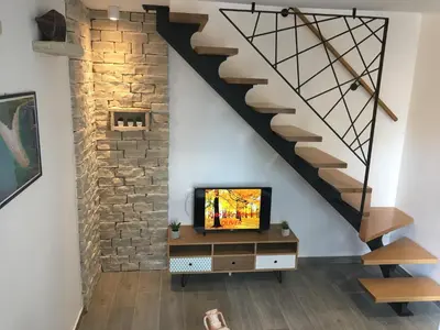 TV i/ili zabavni centar u objektu Paradise Stone Apartments