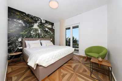 Krevet ili kreveti u jedinici u objektu Apartments REDSTONE luxury apartments