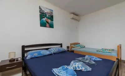 Krevet ili kreveti u jedinici u objektu Apartments Duro