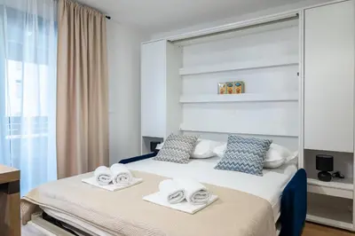 Krevet ili kreveti u jedinici u objektu Apartments Deluxe Vučko