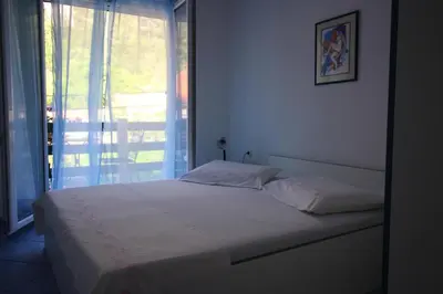 Krevet ili kreveti u jedinici u objektu Apartments by the sea Cove Vela Stiniva, Hvar - 17075