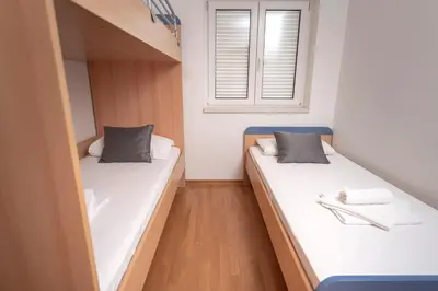 Krevet ili kreveti u jedinici u objektu Villa Dalmatia Apartments