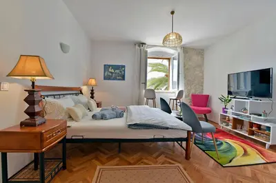 TV i/ili zabavni centar u objektu Harmony Room with a Magical SeaView