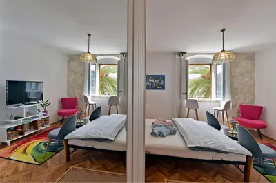 TV i/ili zabavni centar u objektu Harmony Room with a Magical SeaView