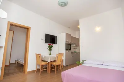Krevet ili kreveti u jedinici u objektu AP PUNTA next to sandy beach, apartment with garden