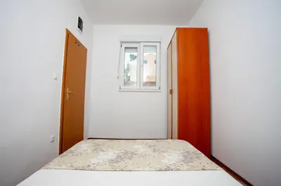 Krevet ili kreveti u jedinici u objektu AP PUNTA next to sandy beach, apartment with garden