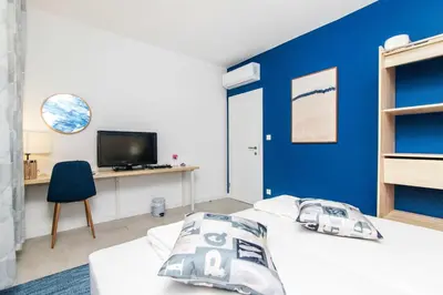 TV i/ili zabavni centar u objektu Apartment 4 Olives