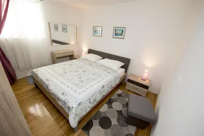 Krevet ili kreveti u jedinici u objektu Apartments by the sea Promajna, Makarska - 17160