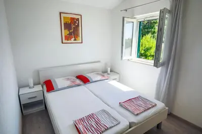 Krevet ili kreveti u jedinici u objektu Apartments 1234