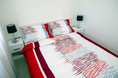 Krevet ili kreveti u jedinici u objektu Apartments 1234