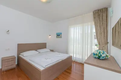 Krevet ili kreveti u jedinici u objektu Apartments Villa Aquamarine