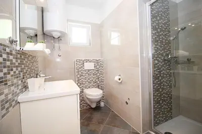 Kupaonica u objektu Villa Pasika with private 31m2 pool, summer kitchen with BBQ, 4 bedrooms