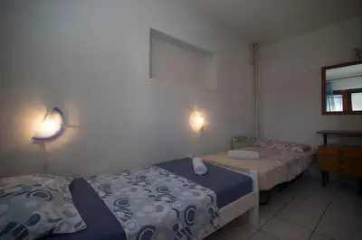 Krevet ili kreveti u jedinici u objektu Apartments and Rooms Nikol