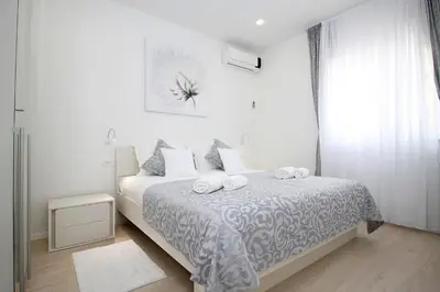 Krevet ili kreveti u jedinici u objektu Villa Dasianda - only 90 m from the beach, private 30msq heated pool