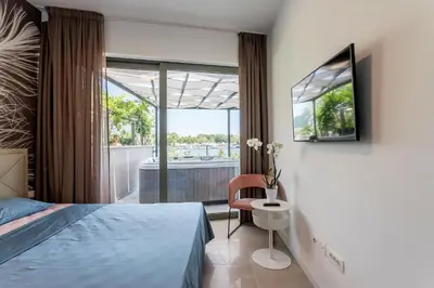 Krevet ili kreveti u jedinici u objektu Luxury Apartment with Hot Tub