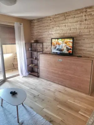 TV i/ili zabavni centar u objektu Apartman Matan, Postira