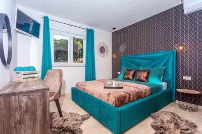 Krevet ili kreveti u jedinici u objektu Villa Matan - only 200m from the sandy beaches, private 28m2 pool