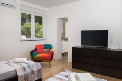 TV i/ili zabavni centar u objektu Absolute Beach Villa
