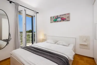 Krevet ili kreveti u jedinici u objektu Sunlight Apartment Hvar