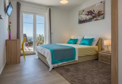 Krevet ili kreveti u jedinici u objektu Holiday House ALMISSA