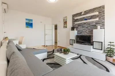 TV i/ili zabavni centar u objektu Holiday House ALMISSA