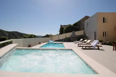 Bazen u objektu VILLA REMUSIC Pool, whirlpool, Sauna,4 bedrooms, amazing landscape ili u blizini