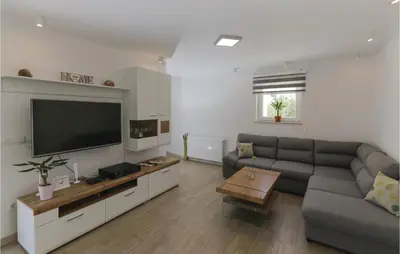 TV i/ili zabavni centar u objektu Amazing Home In Supetar